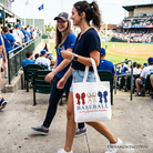 White tote bag with "Baseball Is My Favorite Season" text, featuring a coquette bow, perfect for game day or casual outings.