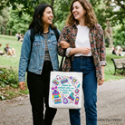 White tote bag featuring "Be Patient I’m From the 1900s" retro 90s throwback design, ideal for shoppers and casual outings.