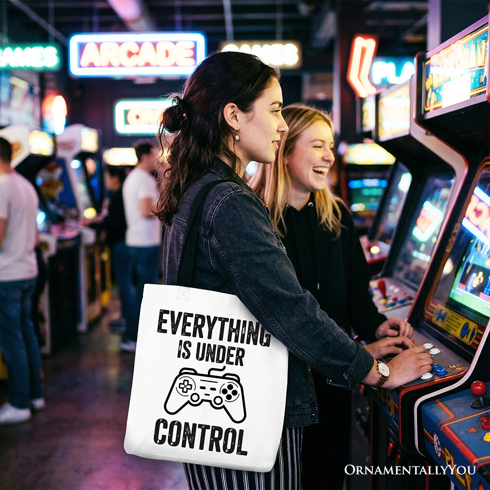 White gamer tote bag by OrnamentallyYou featuring a funny video game controller design for gamers and shoppers.