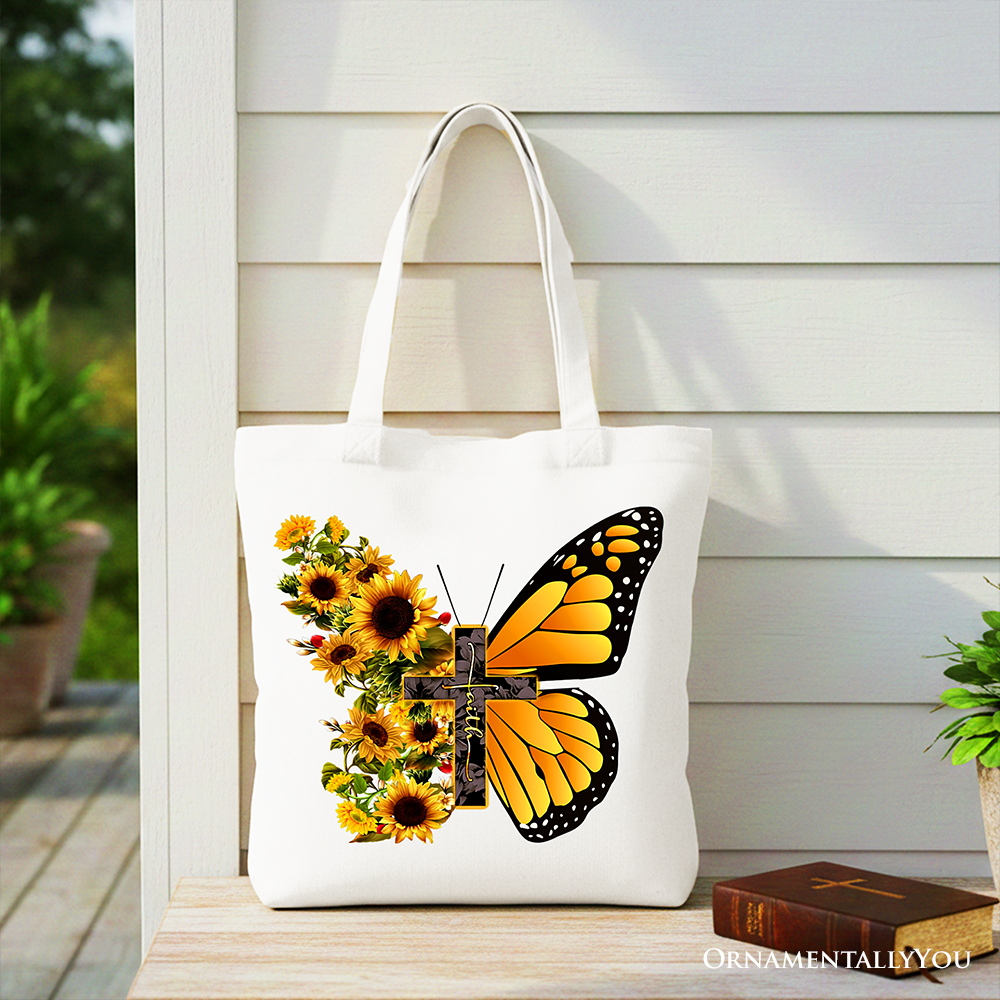 White Christian tote bag with faith cross, butterfly, sunflower floral design, perfect for religious gift or casual shopper.