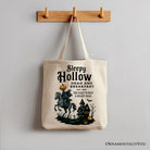 White canvas tote bag featuring Headless Horseman Sleepy Hollow Halloween design, perfect for spooky seasonal accessories.