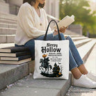 White canvas tote bag featuring a Headless Horseman Sleepy Hollow Halloween design with retro Dead and Breakfast theme.
