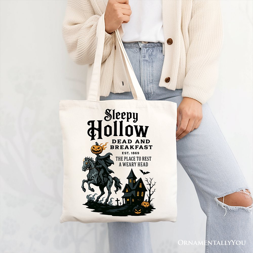 White canvas tote bag featuring the Headless Horseman from Sleepy Hollow Halloween theme, with retro Dead and Breakfast design by OrnamentallyYou.