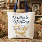 White canvas tote bag with "I’d Rather Be Thrifting" text, perfect for vintage thrift shop lovers and shoppers.