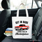 White tote bag from OrnamentallyYou with a humorous red truck design and "I Found A Deal On Marketplace" text, perfect for shoppers.