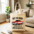 White tote bag by OrnamentallyYou featuring a funny red truck design with the text "I Found A Deal On Marketplace," perfect for shoppers.
