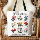 White Christian floral canvas tote bag with "It Is Well With My Soul" Bible verse design by OrnamentallyYou.