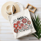White canvas tote bag with floral affirmation design by OrnamentallyYou, featuring motivational and inspirational message for women.