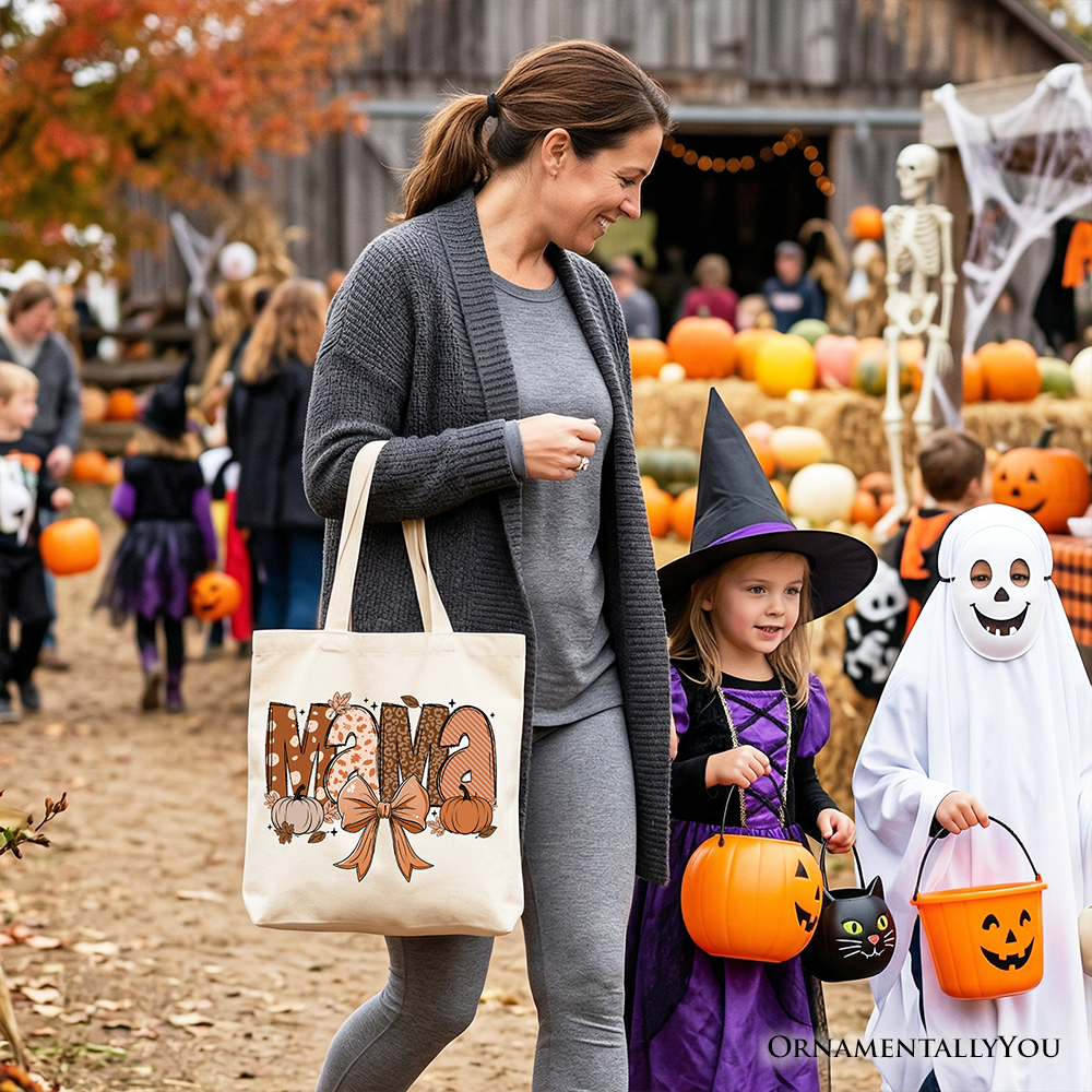 Mama Coquette autumn tote bag by OrnamentallyYou featuring cozy fall pumpkins, perfect for mothers, in white fabric with pumpkin design.