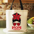 Red bandana glasses and "Mom Things" text on white canvas tote bag, perfect for family matching or casual shopping.
