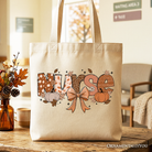 White nurse coquette tote bag with cozy fall pumpkin design, perfect for nurses during autumn.