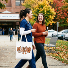 White Nurse Coquette tote bag by OrnamentallyYou featuring cozy fall pumpkin designs, perfect for nurses during autumn.