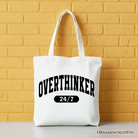 White OrnamentallyYou Over Thinker 24/7 tote bag with minimalist design, perfect for college students and tired women.