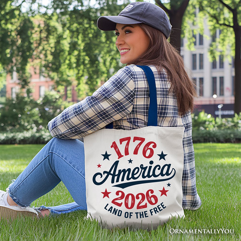 White patriotic canvas tote bag featuring "Land of the Free" and American flag design, celebrating 250 years of independence.