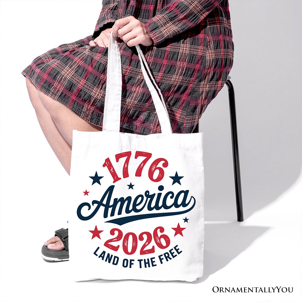 White patriotic canvas tote bag featuring "Land of the Free" design, celebrating 250 years of American independence.