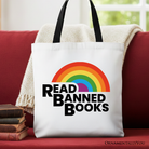 White canvas tote bag featuring a rainbow design with "Read Banned Books" slogan, perfect for book lovers and shoppers.