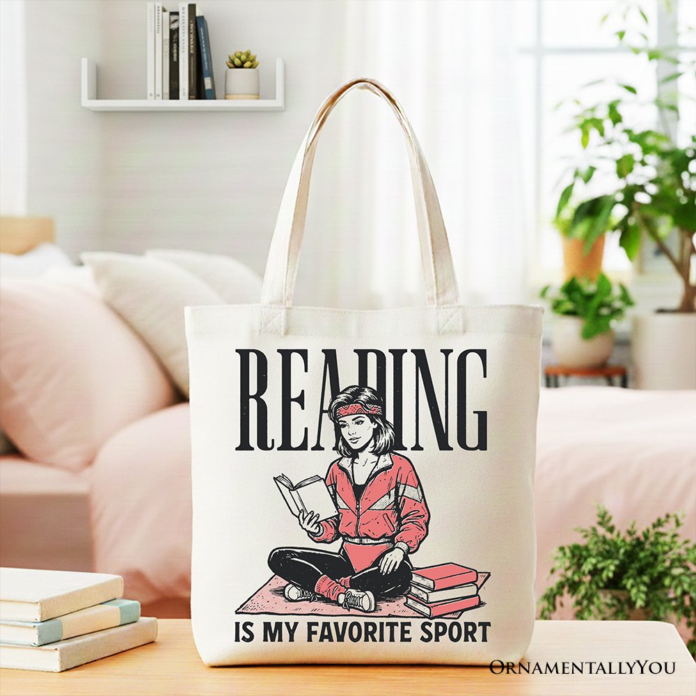 White canvas tote bag with "Reading Is My Favorite Sport" bookworm design, perfect for bibliophiles and book lovers.