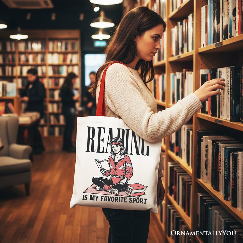 White canvas tote bag with "Reading Is My Favorite Sport" bookworm print, retro bibliophile design, by OrnamentallyYou.