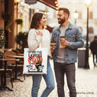 Romantic Frankenstein and Bride canvas tote bag by OrnamentallyYou, featuring spooky couple design on white background.