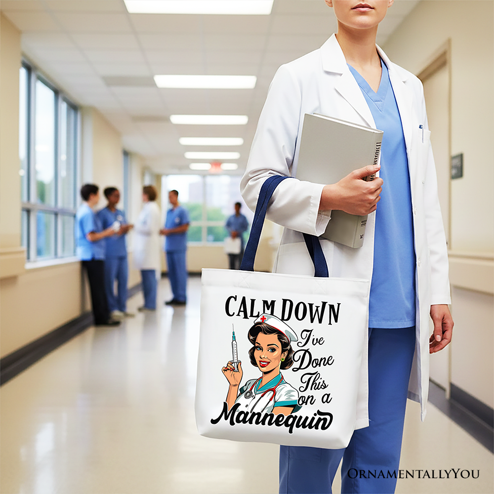 White Sassy Nursing School Tote Bag by OrnamentallyYou with playful text, displayed on a mannequin for gift shopping.
