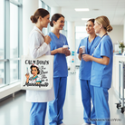 White Sassy Nursing School Tote Bag by OrnamentallyYou with playful text "Calm Down I’ve Done This" on a mannequin.