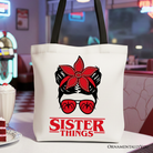 OrnamentallyYou Sister Things messy bun retro canvas tote bag with red bandana glasses design, perfect for family matching gift shoppers.