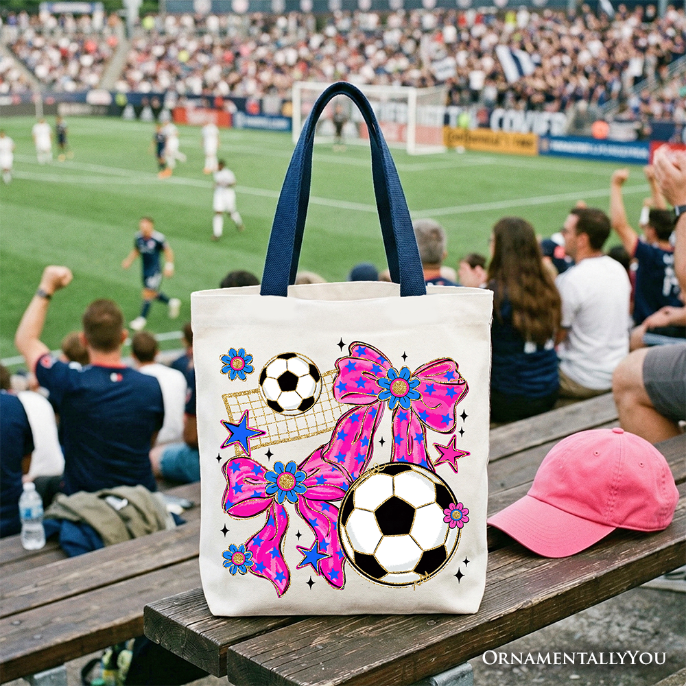 OrnamentallyYou pink bow tote bag with soccer-themed design, perfect for preppy game day shopping or gift-giving.