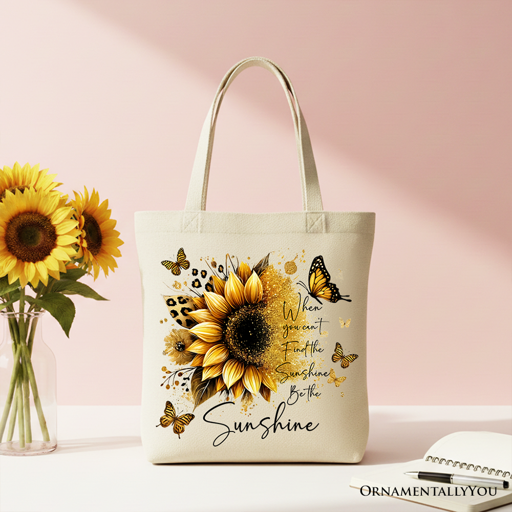 White canvas tote bag with sunflower design and inspirational quote "When you can’t find the sunshine, be the sunshine" by OrnamentallyYou.