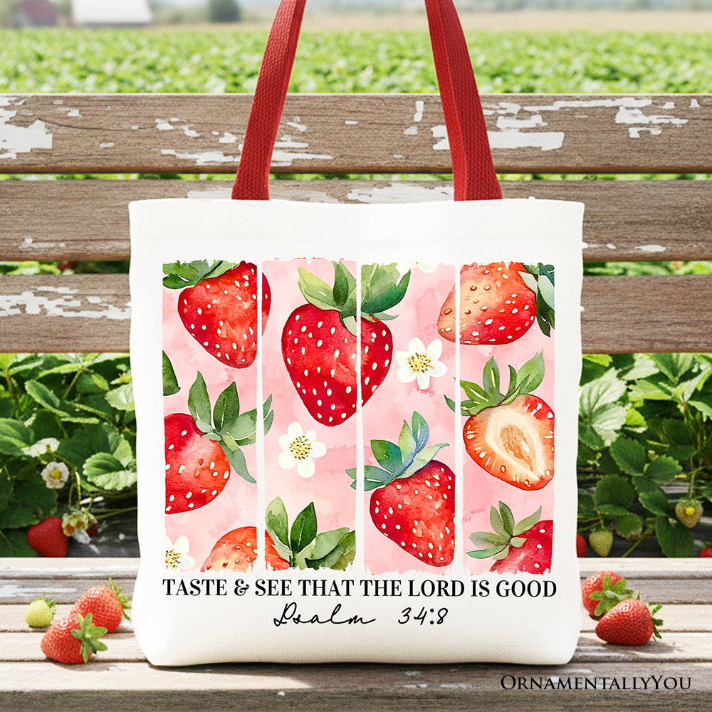 White Christian faith tote bag by OrnamentallyYou with "Taste and See That The Lord Is Good" strawberry design, perfect for faith gifts.