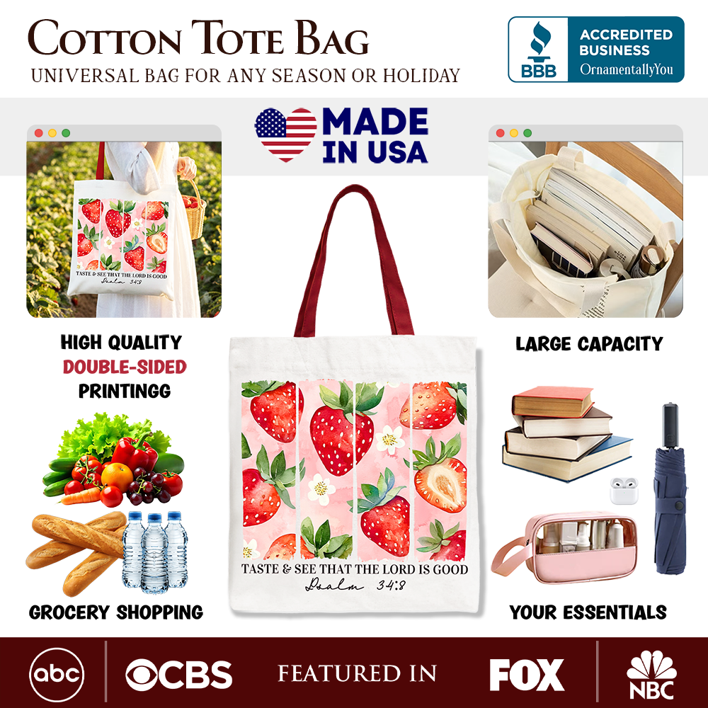 Christian faith tote bag featuring a strawberry design with the phrase "Taste and See That The Lord is Good" on white canvas.