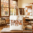 White Teacher Coquette Autumn Tote Bag by OrnamentallyYou featuring cozy fall pumpkin design, perfect for educators and fall shoppers.