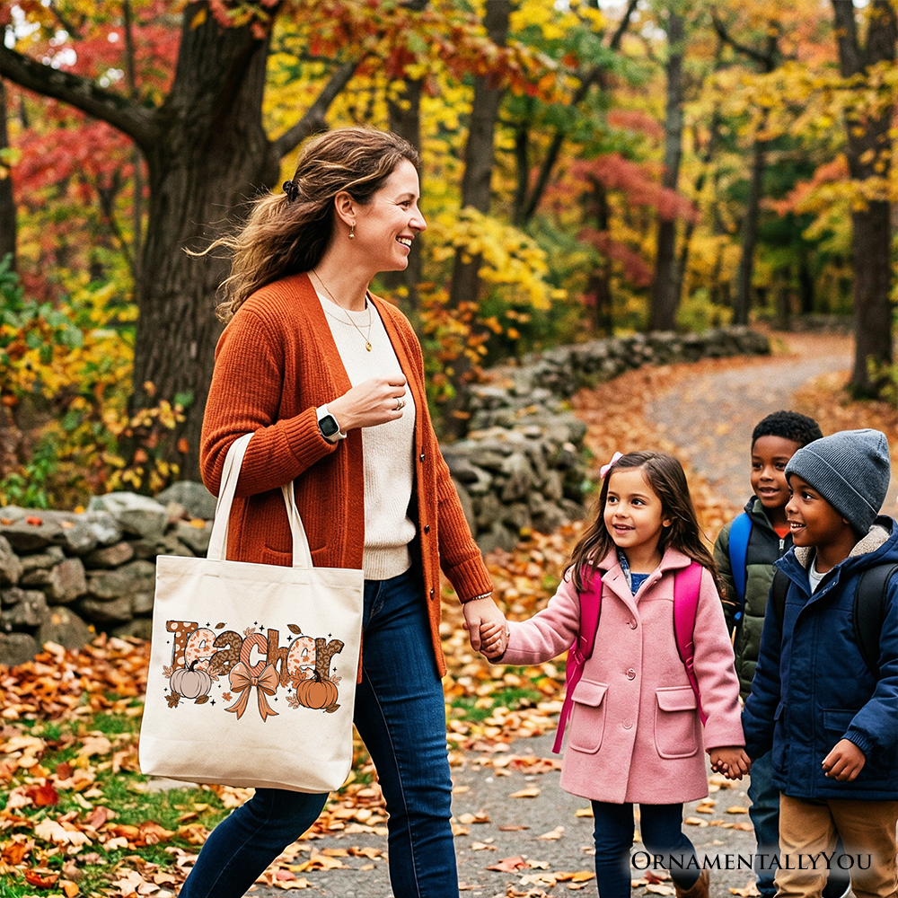 White Teacher Coquette Autumn Tote Bag by OrnamentallyYou with cozy fall pumpkin design, perfect for educators and fall shoppers.