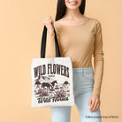 White canvas tote bag featuring wildflowers and wild horses print, retro western style for free-spirited women.