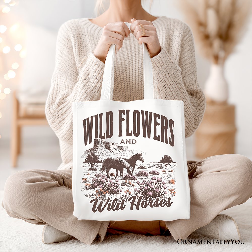 White canvas tote bag with wildflowers and wild horses print, featuring a retro western design for free-spirited women.