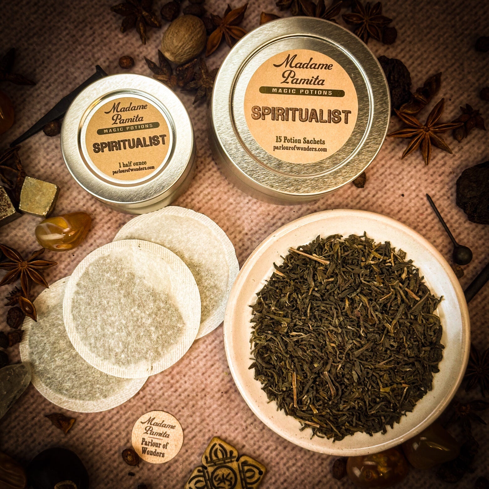 Set of 15 sachets in Parlour of Wonders Spiritualist Potion Spell Kit, featuring colorful herbal and magical potion ingredients.