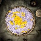 Small jar of Parlour of Wonders Absolute Power Bath Crystals with colorful crystals in a clear container.