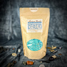 Small jar of Parlour of Wonders Banishing Bath Crystals, aromatic bath crystals for cleansing and relaxation.