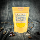 Small jar of Parlour of Wonders Bountiful Blessings Bath Crystals featuring colorful crystals and a calming, luxurious bath setting.