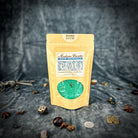 Parlour of Wonders Good Luck Bath Crystals in a clear glass jar with colorful crystals for relaxing bath aromatherapy.
