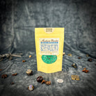 Small jar of Parlour of Wonders Good Luck Bath Crystals with colorful crystals and a calming, relaxing bath experience.