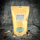 Small jar of Parlour of Wonders Santa Muerte Bath Crystals with crystals and label visible in the image.