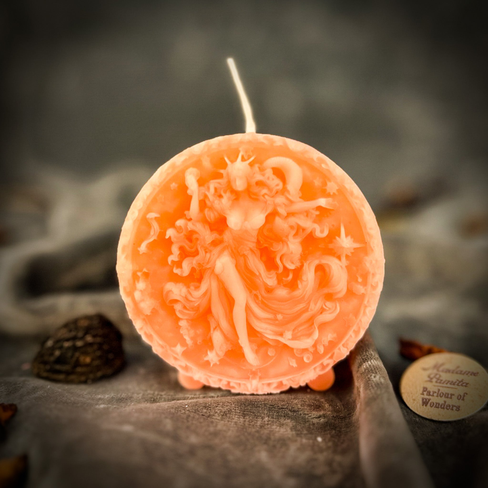 Blue beeswax candle featuring Aquarius Water Bearer zodiac symbols, representing innovation, vision, and independence.