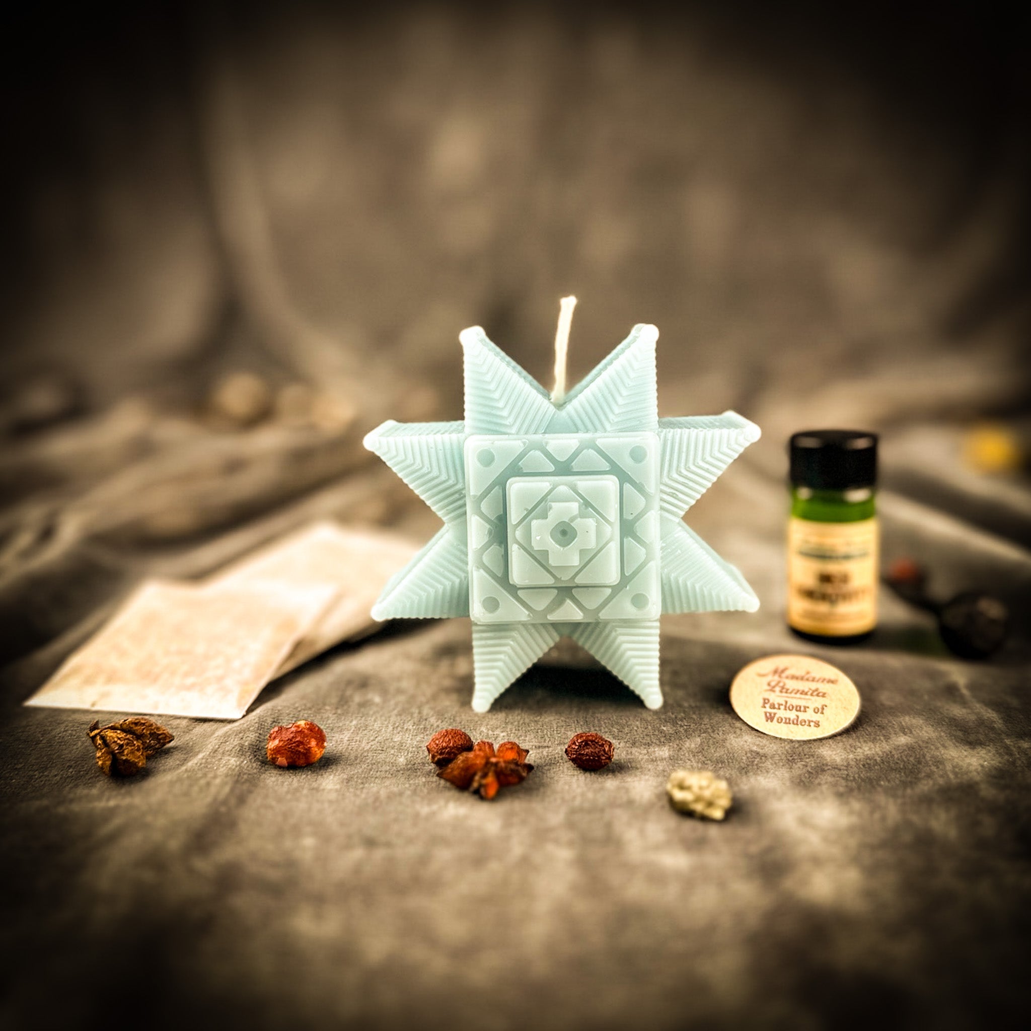 Blue beeswax candle from Parlour of Wonders' Burst of Brilliance Ruzha Candle Spell Kit, featuring a natural beeswax finish for communication.