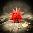 Blue beeswax candle from Parlour of Wonders' Burst of Brilliance Ruzha Candle Spell Kit, featuring intricate wax details.