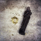 Blue beeswax Mother Mary spell candle by Parlour of Wonders, featuring detailed imagery for divine protection and love magic.