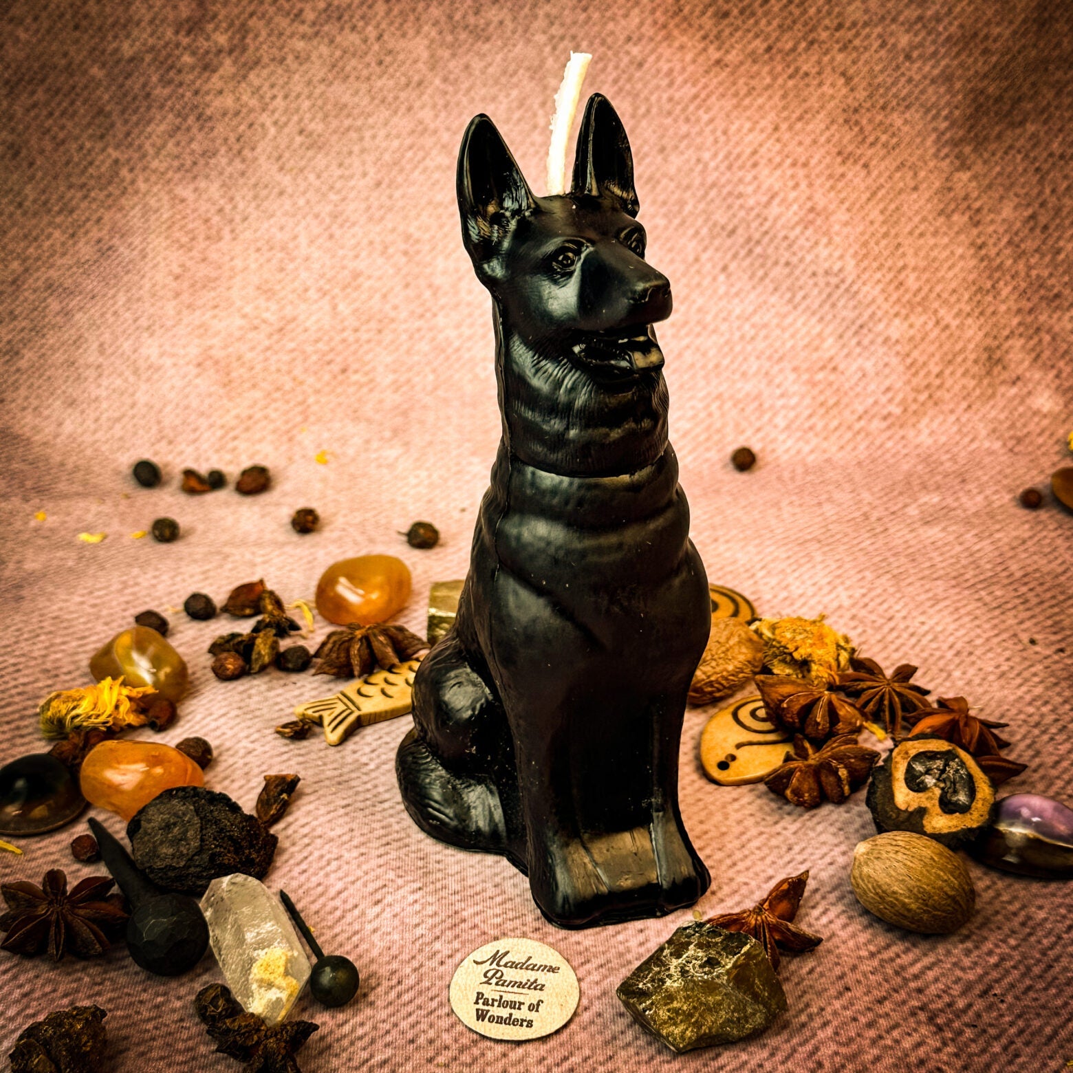 Brown beeswax candle shaped like a loyal dog, symbolizing fidelity, loyalty, and unconditional love, from Parlour of Wonders.