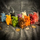 Beeswax Squirrel of Abundance spell candle by Parlour of Wonders, featuring a brown squirrel design for prosperity and savings.