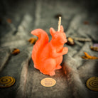 Beeswax Squirrel of Abundance spell candle by Parlour of Wonders, featuring a brown squirrel design for prosperity and savings.