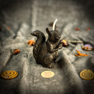 Beeswax Squirrel of Abundance spell candle by Parlour of Wonders, brown beeswax with detailed squirrel design for prosperity and savings.