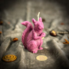 Parlour of Wonders beeswax squirrel of abundance spell candle with natural brown beeswax, symbolizing savings, prosperity, and grounding.